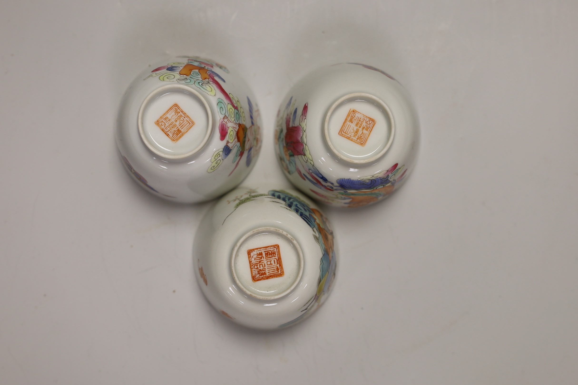 Three Chinese famille rose 'immortals' cups, 6cm tall